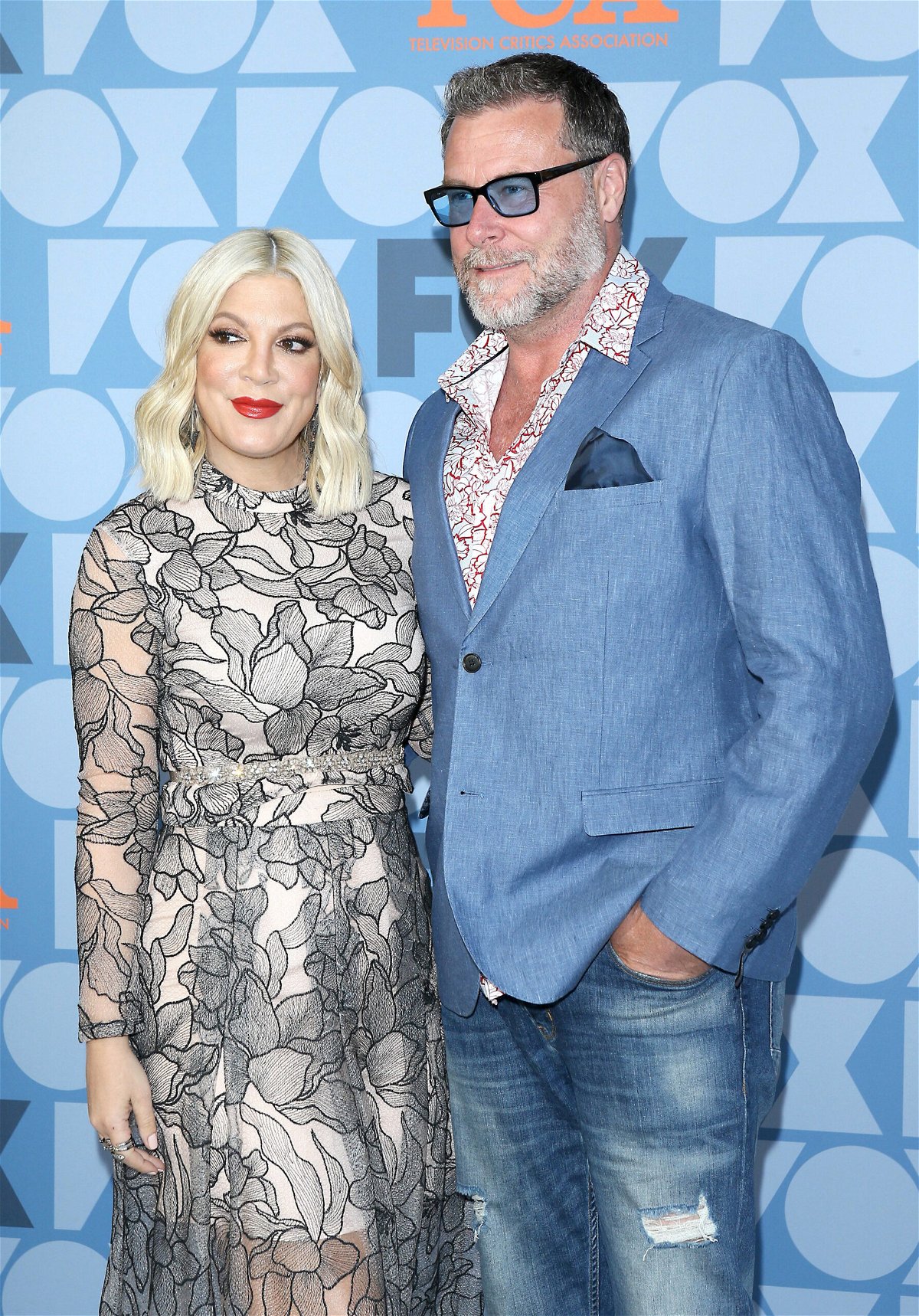 <i>Michael Tran/AFP/Getty Images</i><br/>Tori Spelling and her husband Dean McDermott attend the FOX Summer TCA 2019 All-Star Party at Fox Studios on August 7