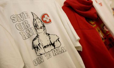 A T-shirt with the words "Save Our Land Join The Klan" inside the Redneck Shop.