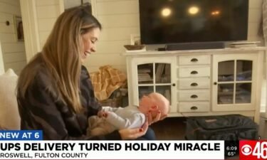 A UPS driver stopped after delivering a package in a Roswell neighborhood earlier this month to wish the parents of a newborn baby boy well.