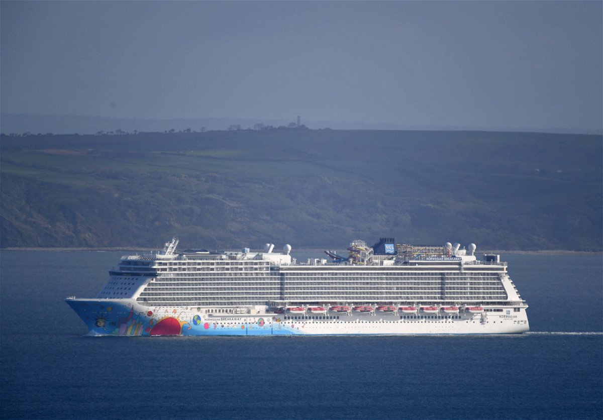 <i>Finbarr Webster/Shutterstock</i><br/>10 Covid-19 cases are identified on a New Orleans-bound cruise ship. The Norwegian Breakaway is shown here entering the Portland Port near Dorset