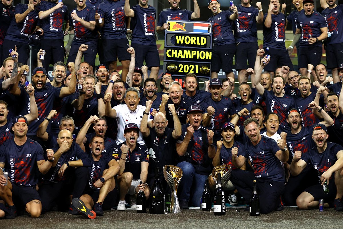 <i>Bryn Lennon/Getty Images</i><br/>Max Verstappen celebrates with his team after the Abu Dhabi Grand Prix.
