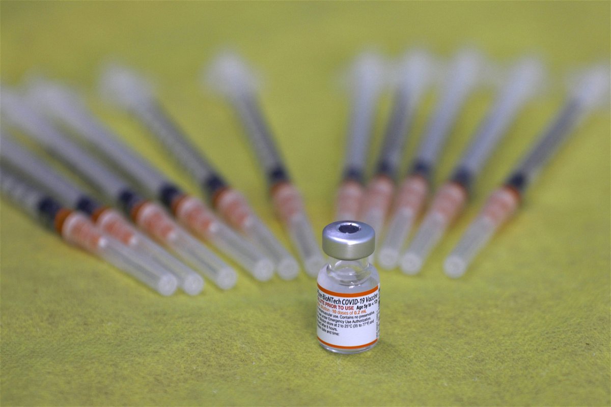 <i>Jalaa Marey/AFP/Getty Images</i><br/>A picture shows a vial of the Pfizer/BioNTech Covid-19 vaccine during a vaccination drive at the al-Manahel School in the Druze village of Majdal Shams in the Israel-annexed Golan Heights.