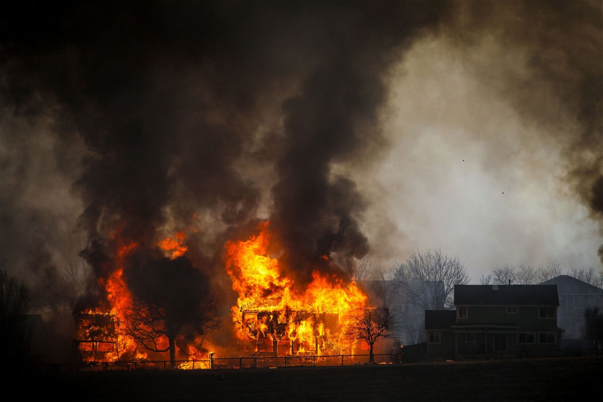 <i>Marc Piscotty/Getty Images</i><br/>Two homes burn in Boulder County