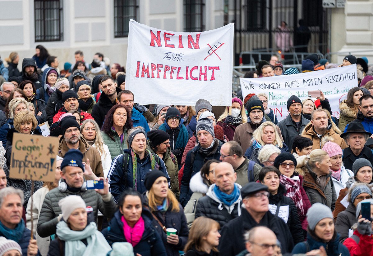 <i>Georg Hochmuth/AFP/Getty Images</i><br/>A demonstrator holds a placard reading 'No to compulsory vaccination' during an anti-vaccination protest at the Ballhausplatz in Vienna