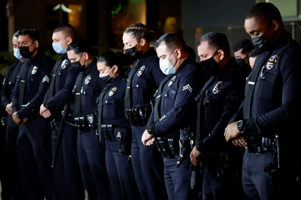 <i>Gina Ferazzi/Los Angeles Times/Getty Images</i><br/>Federal prosecutors charged three alleged gang members and one alleged gang associate on January 13 in the fatal shooting of off-duty Los Angeles Police Department officer Fernando Arroyos during an attempted robbery.