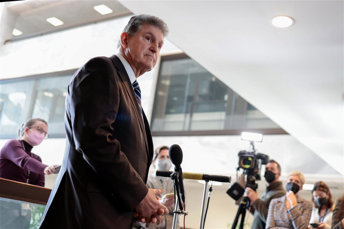 <i>Anna Moneymaker/Getty Images</i><br/>Sen. Joe Manchin (D-WV) speaks to reporters outside of his office on Capitol Hill on January 4