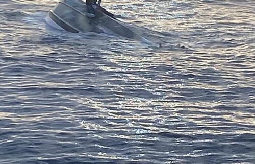 The US Coast Guard said a man was rescued from a capsized boat by a good Samaritan on Tuesday morning.