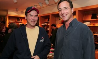 Norm Macdonald and Bob Saget at a book signing in Los Angeles