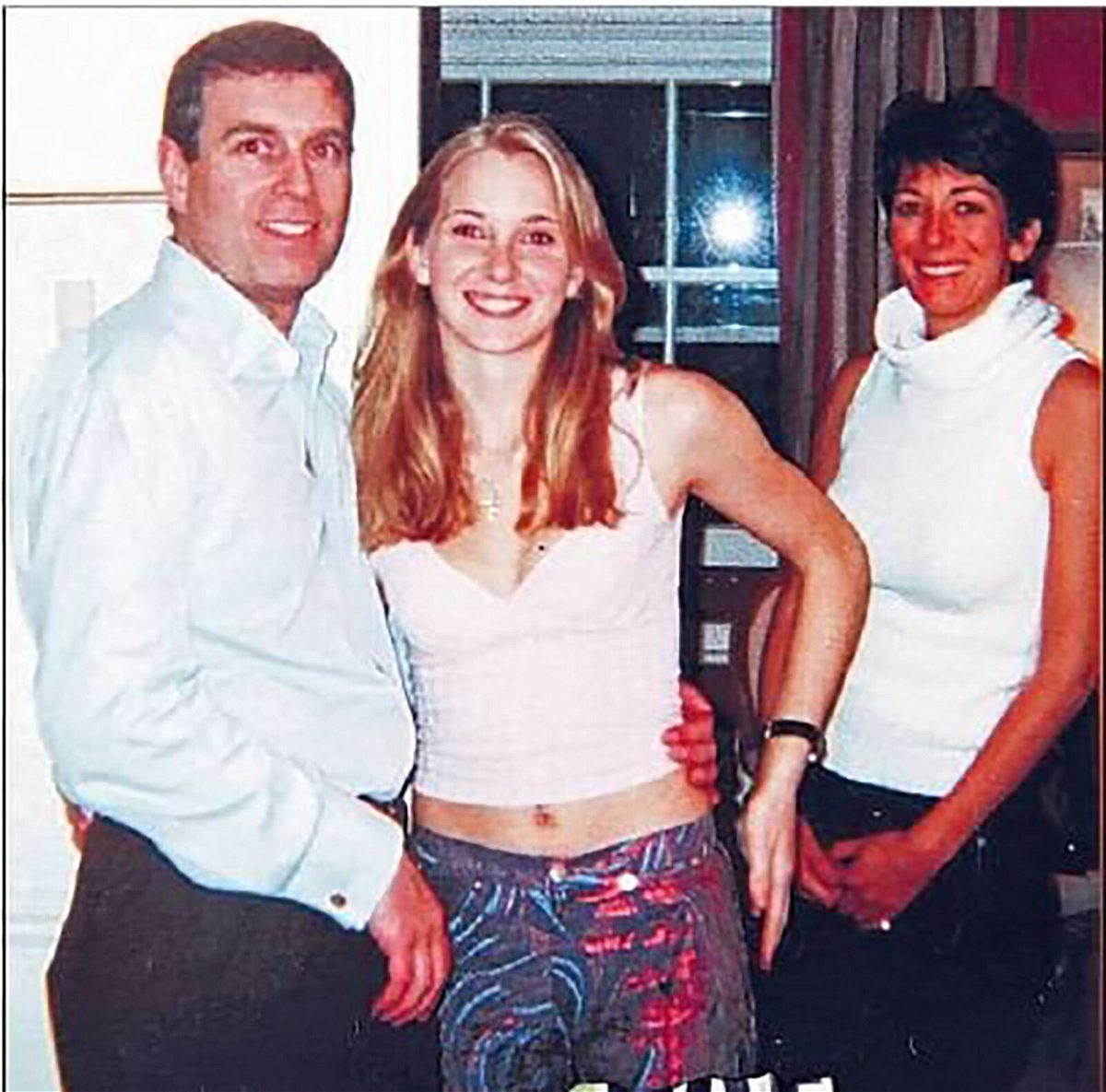 <i>Florida Southern District Court</i><br/>Photograph appearing to show Prince Andrew Duke York with Jeffrey Epstein's accuser Virginia Guifre and alleged madam Ghislaine Maxwell.