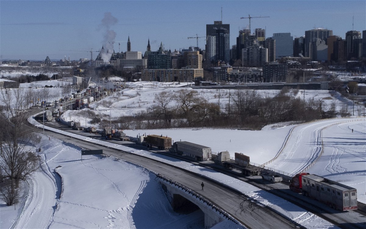 <i>Adrian Wyld/Canadian Press/AP</i><br/>Vehicles in the protest convoy parked on a road leading into downtown Ottawa on Sunday.