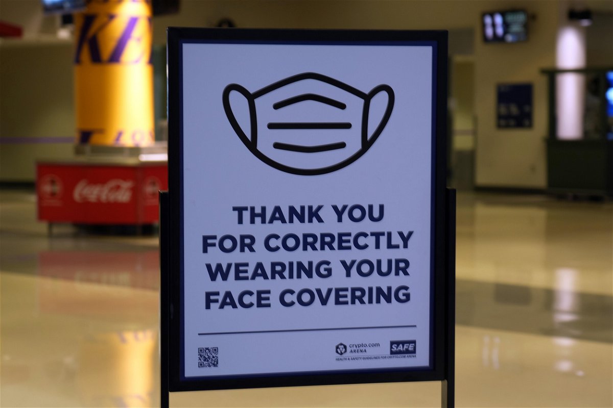 <i>Kirby Lee/USA TODAY Sports</i><br/>A face mask advisory sign is posted at Crypto.com Arena during an NBA game between the Los Angeles Lakers and the Sacramento Kings.