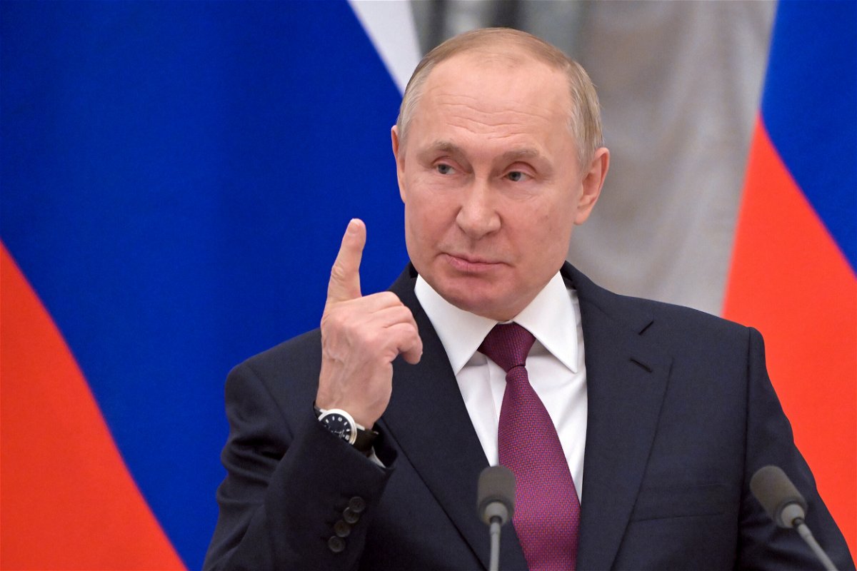 <i>Sergey Guneev/Kremlin Pool Photo/Sputnik/AP</i><br/>Russian President Vladimir Putin gestures as he speaks during a joint news conference with German Chancellor Olaf Scholz following their talks in the Kremlin in Moscow