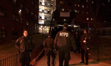 Police investigate after an off-duty NYPD officer was shot in the foot Saturday in West Harlem.