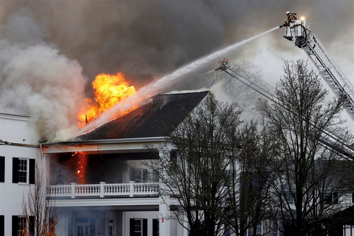 <i>Eric Seals/Detroit Free Press/USA Today</i><br/>Firefighters from multiple departments at work on the fire.