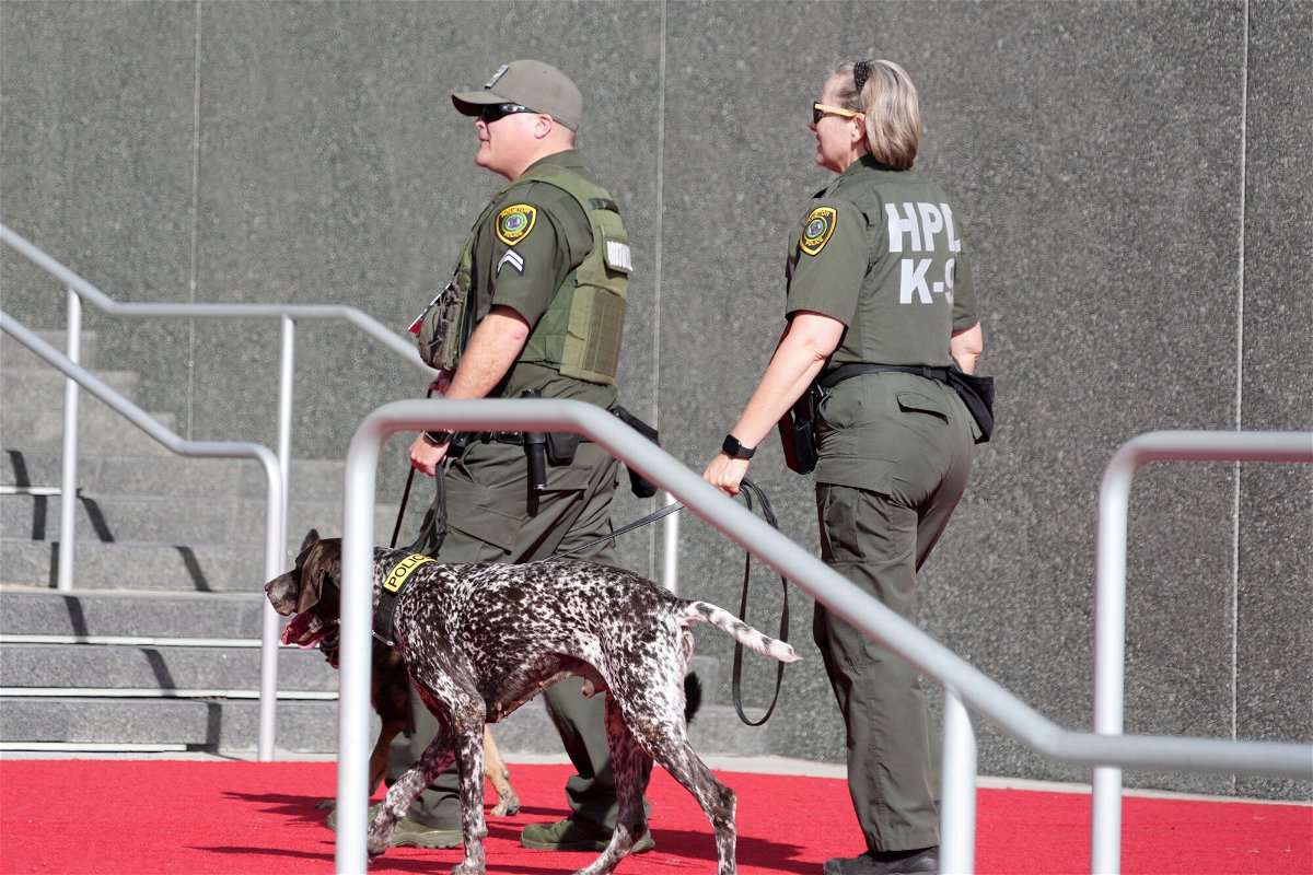 <i>Kirby Lee/USA Today Sports</i><br/>Houston Police Dept. explosive detection dogs Betti and Baron patrol SoFi Stadium prior to Super Bowl LVI.