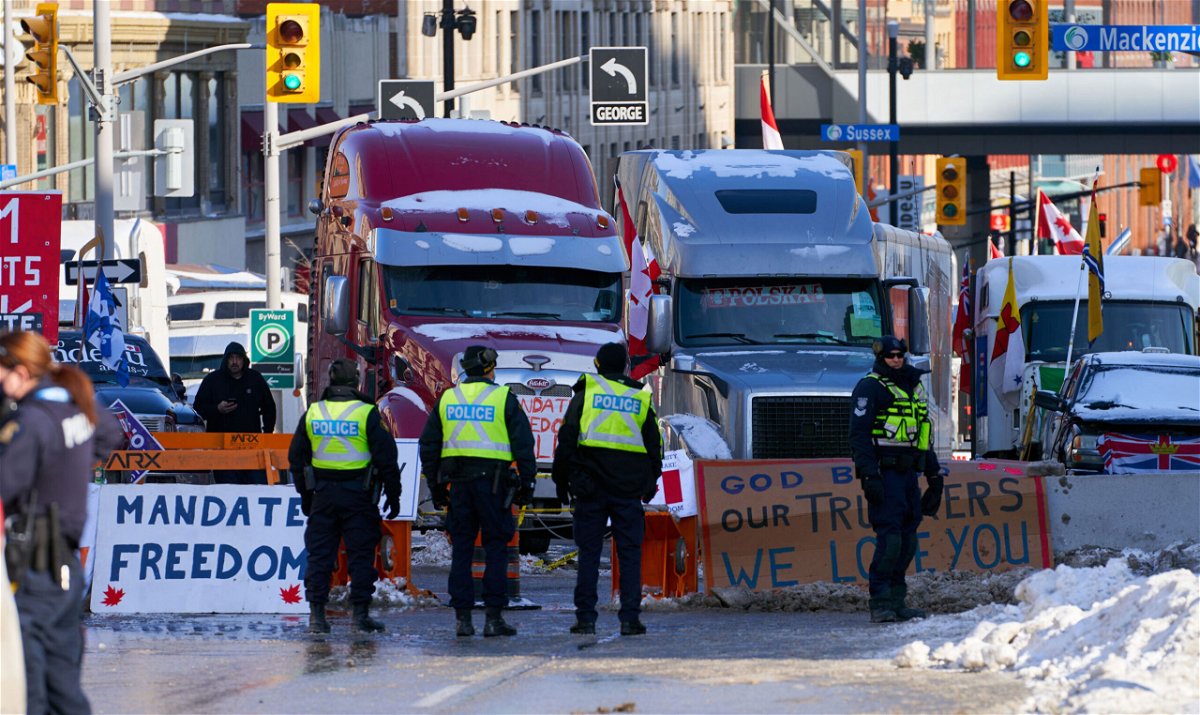 <i>Andre Pichette/EPA-EFE/Shutterst/Shutterstock</i><br/>Canadian protesters block access to the busiest international crossing in North America as demonstrations against Covid-19 measures continue.