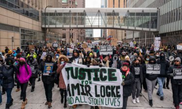 A racial justice march for Amir Locke moves through downtown Minneapolis on February 5