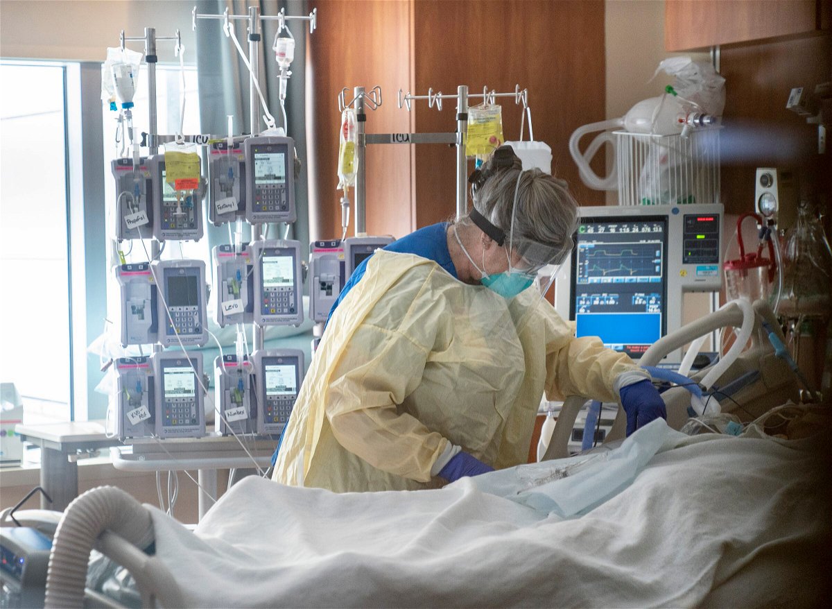 <i>Mandi Wright/USA Today Network</i><br/>An RN tends to an intubated Covid-19 patient in the intensive care unit of St. Joseph Mercy Oakland Hospital in Pontiac
