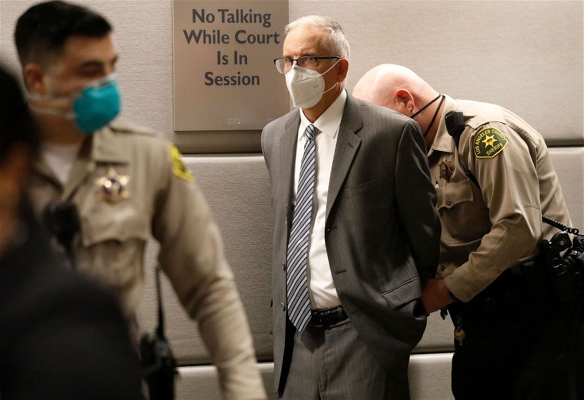 <i>Al Seib/Los Angeles Times//Getty Images</i><br/>Former UCLA Gynecologist Dr. James Heaps is taken into custody as he appears in Los Angeles Superior Court on August 3