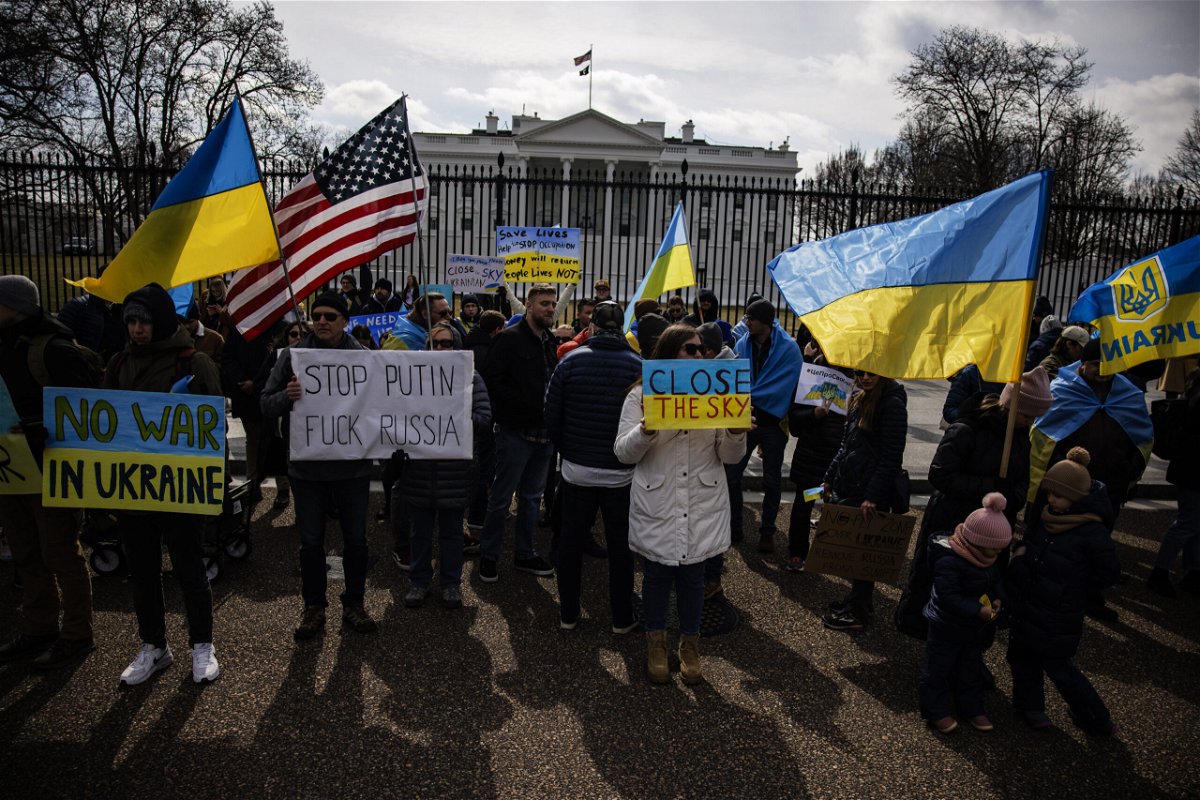 <i>Samuel Corum/Getty Images</i><br/>People participate in a pro-Ukrainian demonstration in front of the White House to protest the Russian invasion of Ukraine on February 26 in Washington