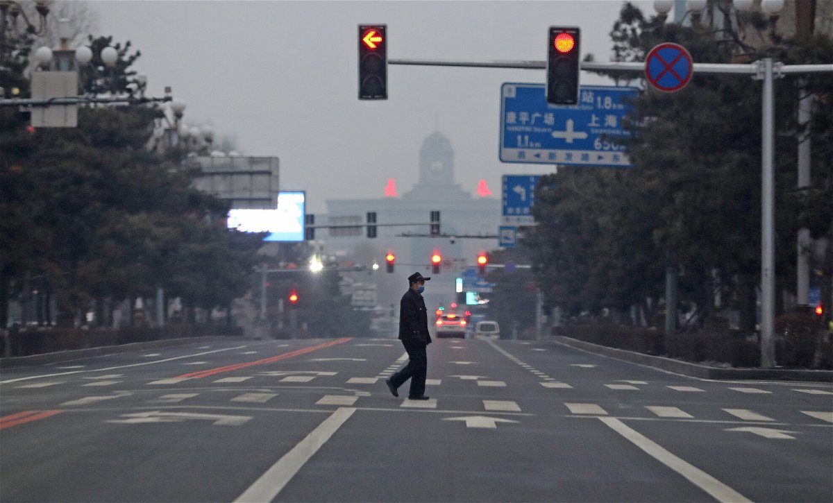 <i>Feature China/Future Publishing/Getty Images</i><br/>Seen here is a man walking across an empty road in Changchun
