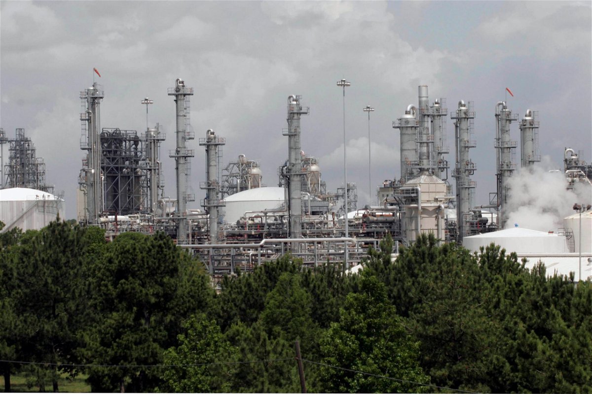 <i>F. Carter Smith/Bloomberg/Getty Images</i><br/>The Justice Department has secured a settlement with the chemical company Chevron Phillips to make upgrades at three of its Texas petrochemical plants amid allegations that it violated the Clean Air Act and state air pollution control laws. The Chevron Phillips Cedar Bayou petrochemical plant is shown here in 2005.