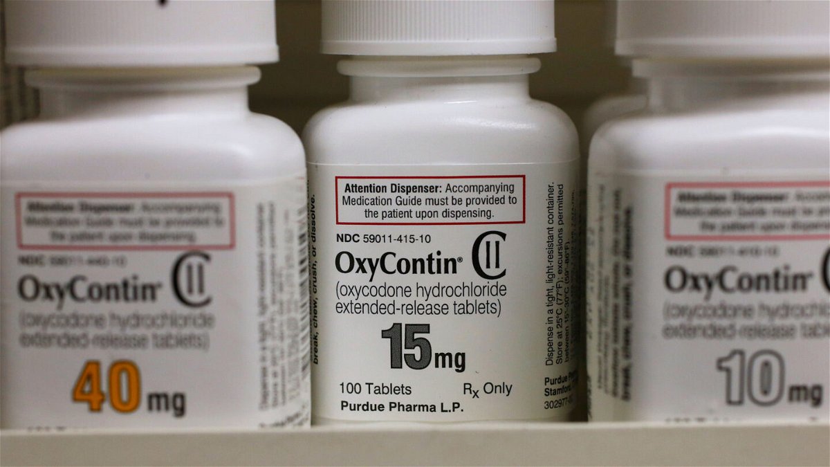 <i>George Frey/Bloomberg via Getty Images</i><br/>Victims of the opioid crisis confront owners of OxyContin maker Purdue Pharma.