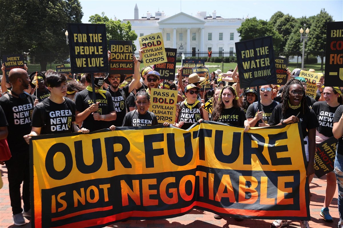 <i>Chip Somodevilla/Getty Images</i><br/>Climate activists rally near the White House in Washington on June 28