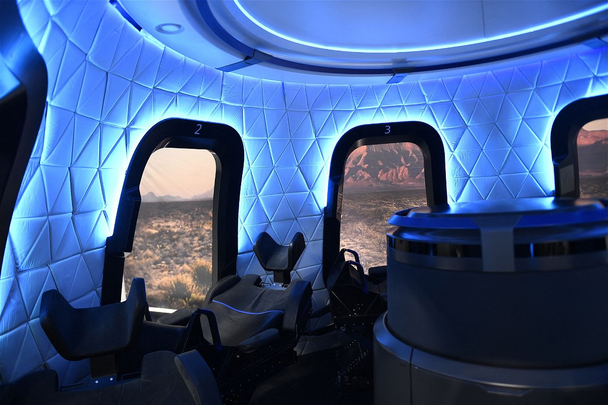 <i>Patrick T. Fallon/AFP/Getty Images</i><br/>The interior of a Blue Origin capsule on display in December 2021