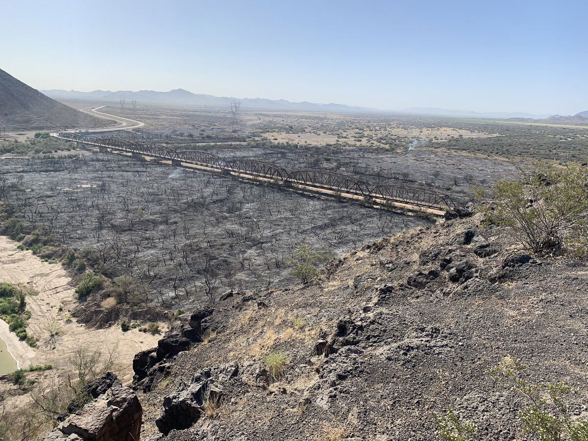 Rapidly moving wildfire in Arizona destroys dozens of structures and