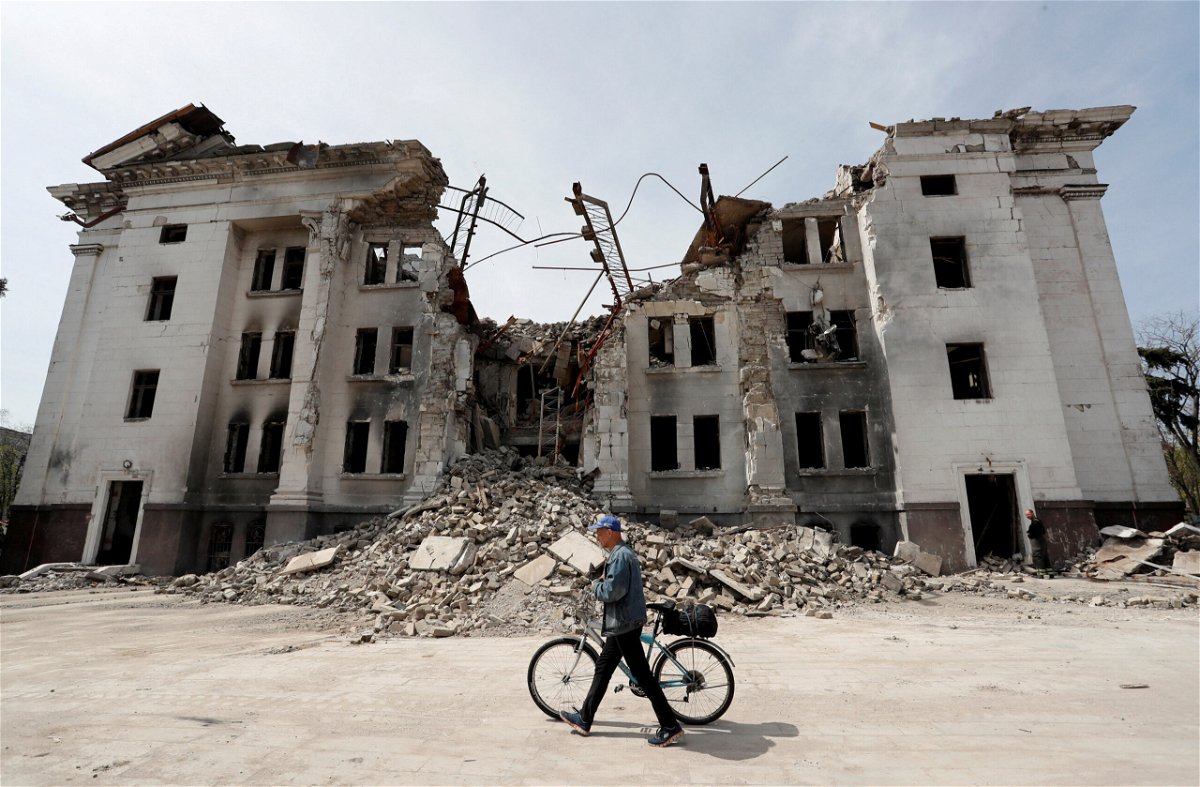 <i>Alexander Ermochenko/Reuters</i><br/>A theatre building is destroyed during the Ukraine-Russia conflict in the southern port city of Mariupol