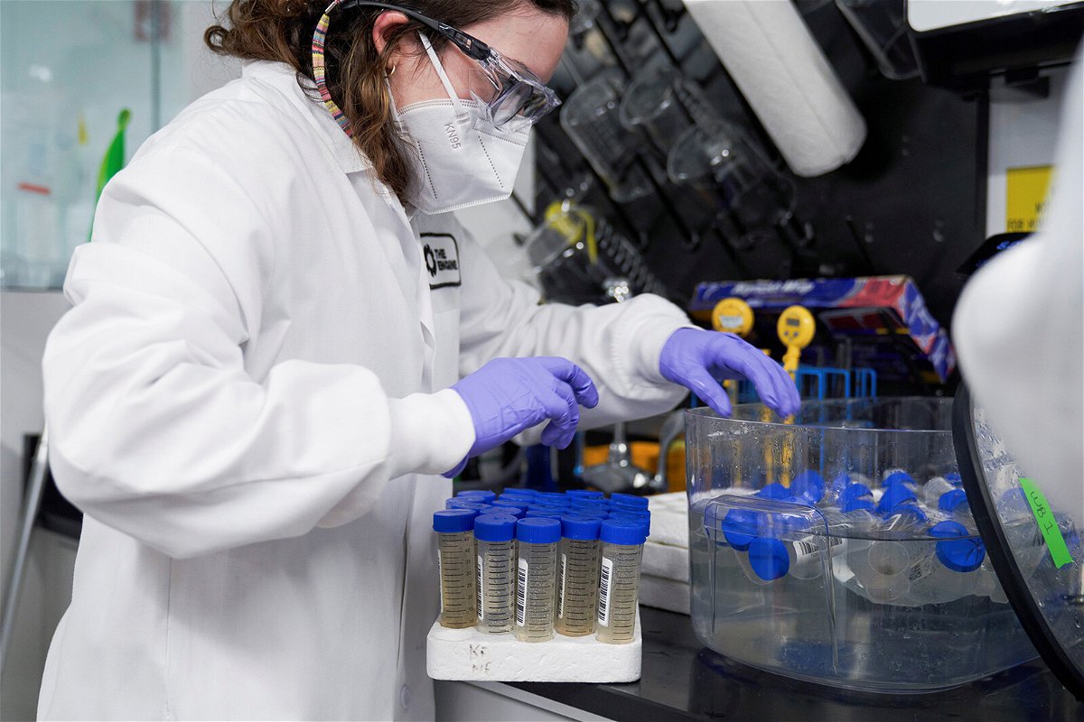 <i>Allison Dinner/Reuters</i><br/>A lab technician tests wastewater samples from around the United States in Cambridge