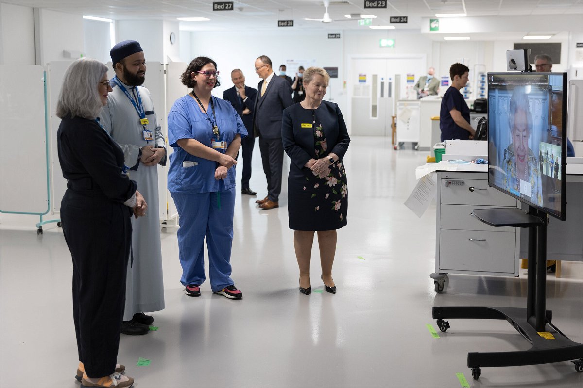 <i>Handout/Publicity/Getty Images</i><br/>The Queen heard from hospital staff about their experiences of working on the front line during the pandemic.