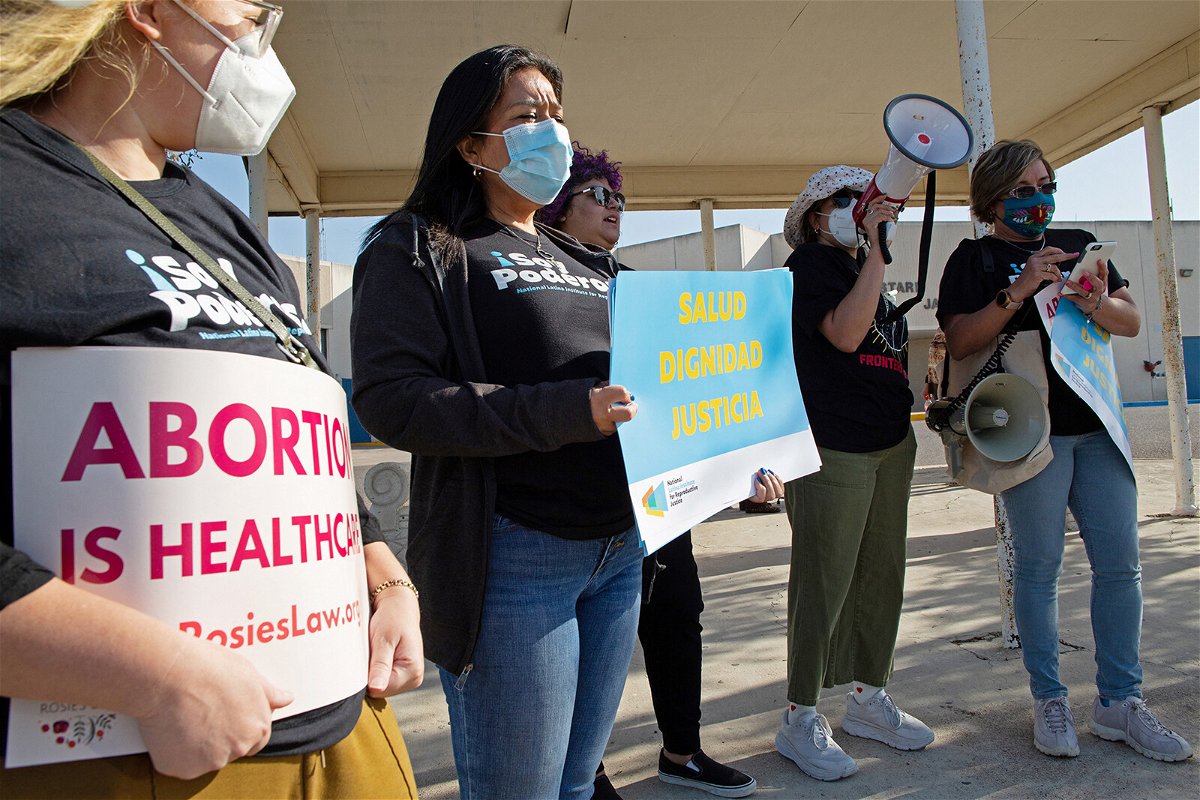 <i>Jason Garza/Reuters</i><br/>Protesters stand outside the Starr County Jail after a woman was charged with murder for allegedly performing what authorities called a 