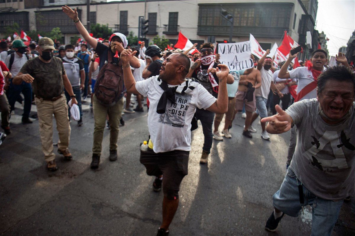 <i>Ernesto Benavides/AFP/Getty Images</i><br/>Demonstrators protest Peruvian President Pedro Castillo's government in Lima on Tuesday.