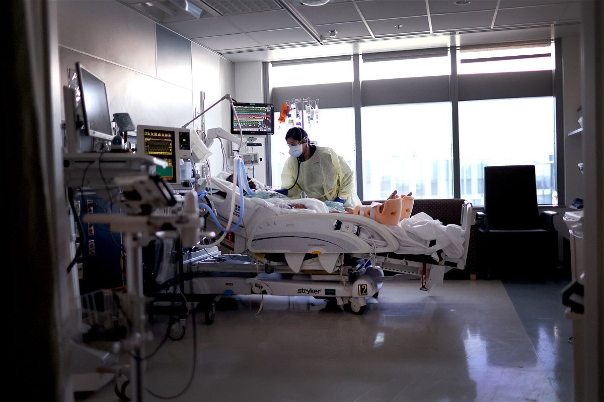<i>Scott Olson/Getty Images</i><br/>Respiratory Therapist Nirali Patel works with a Covid-19 patient in the ICU at Rush University Medial Center on January 31 in Chicago