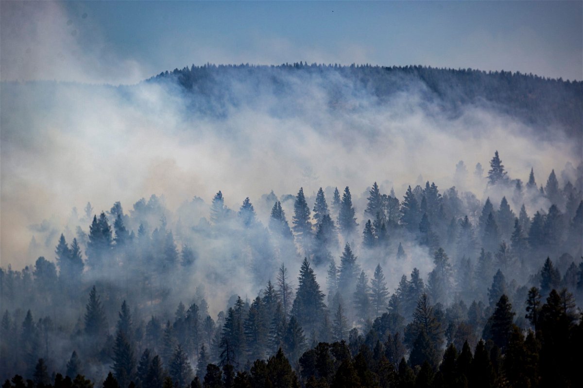 <i>Ivan Pierre Aguirre/USA Today Network/Reuters</i><br/>The McBride Fire ravaged hilltops above Ruidoso on April 13