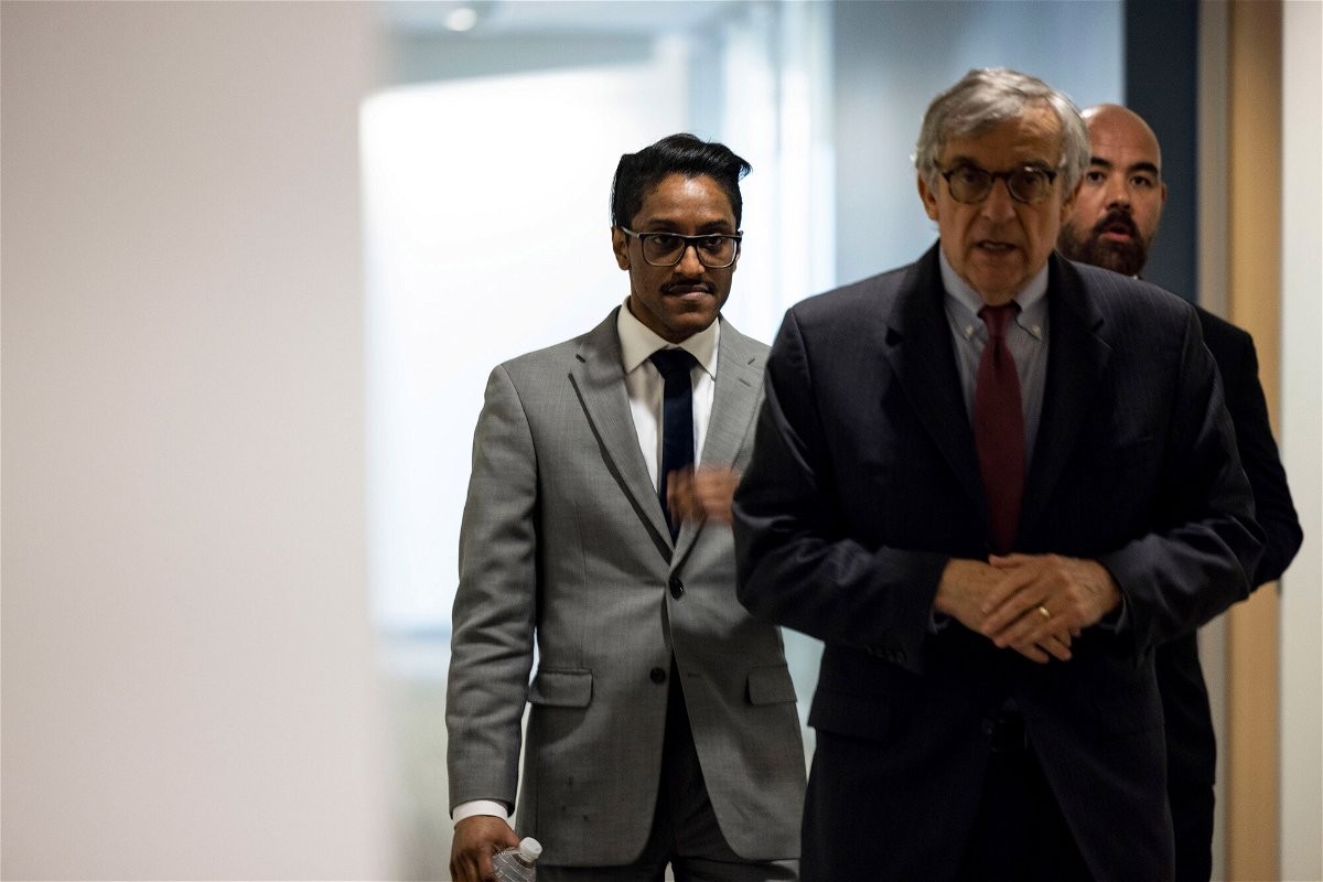 <i>Anna Moneymaker/Getty Images</i><br/>Stop the Steal organizer Ali Alexander (left) returns to a conference room for a deposition meeting on Capitol Hill with the House select committee investigating the January 6 attack on December 9