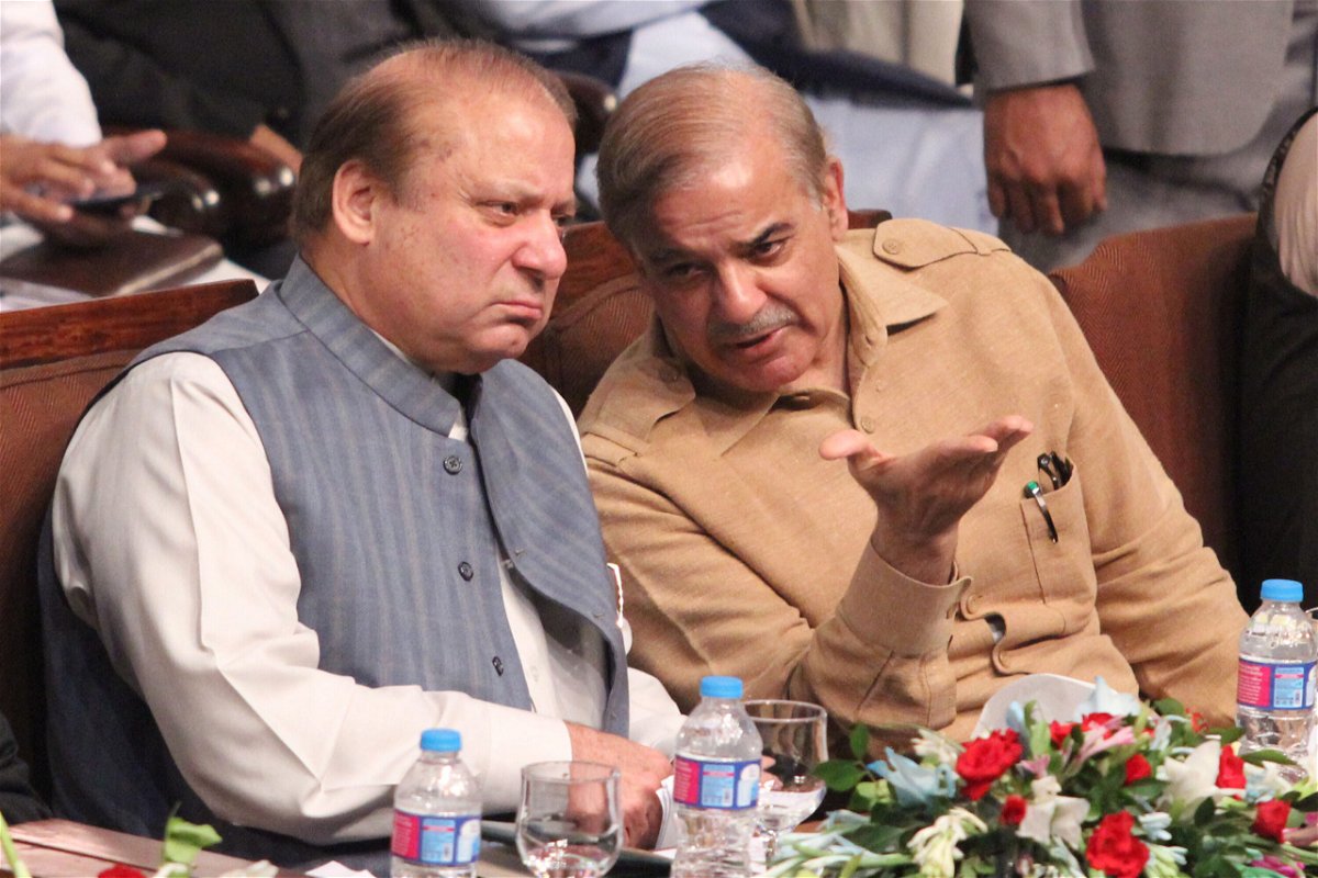 <i>Rana Imran/NurPhoto/Getty Images</i><br/>Pakistan's former prime minister Nawaz Sharif (L) with his younger brother Shehbaz Sharif in Lahore