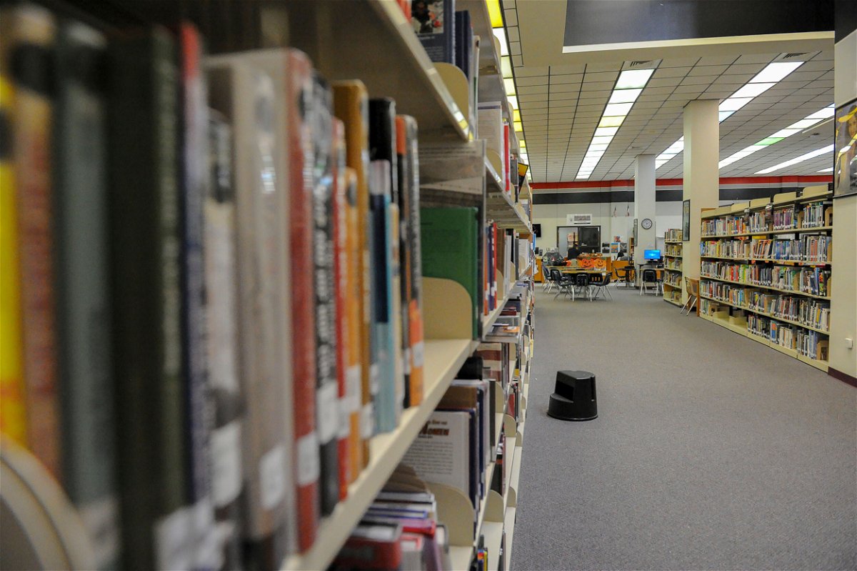 <i>Jason Hoekema/The Brownsville Herald/AP</i><br/>Books line the shelves of a high school library in Brownsville