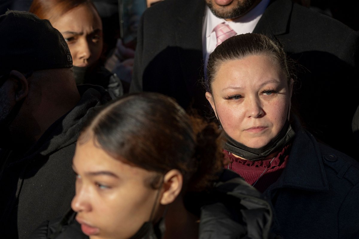 <i>Christian Monterrosa/AP</i><br/>Daunte Wright's mom looks at the crowd gathered outside the Hennepin County Government Center