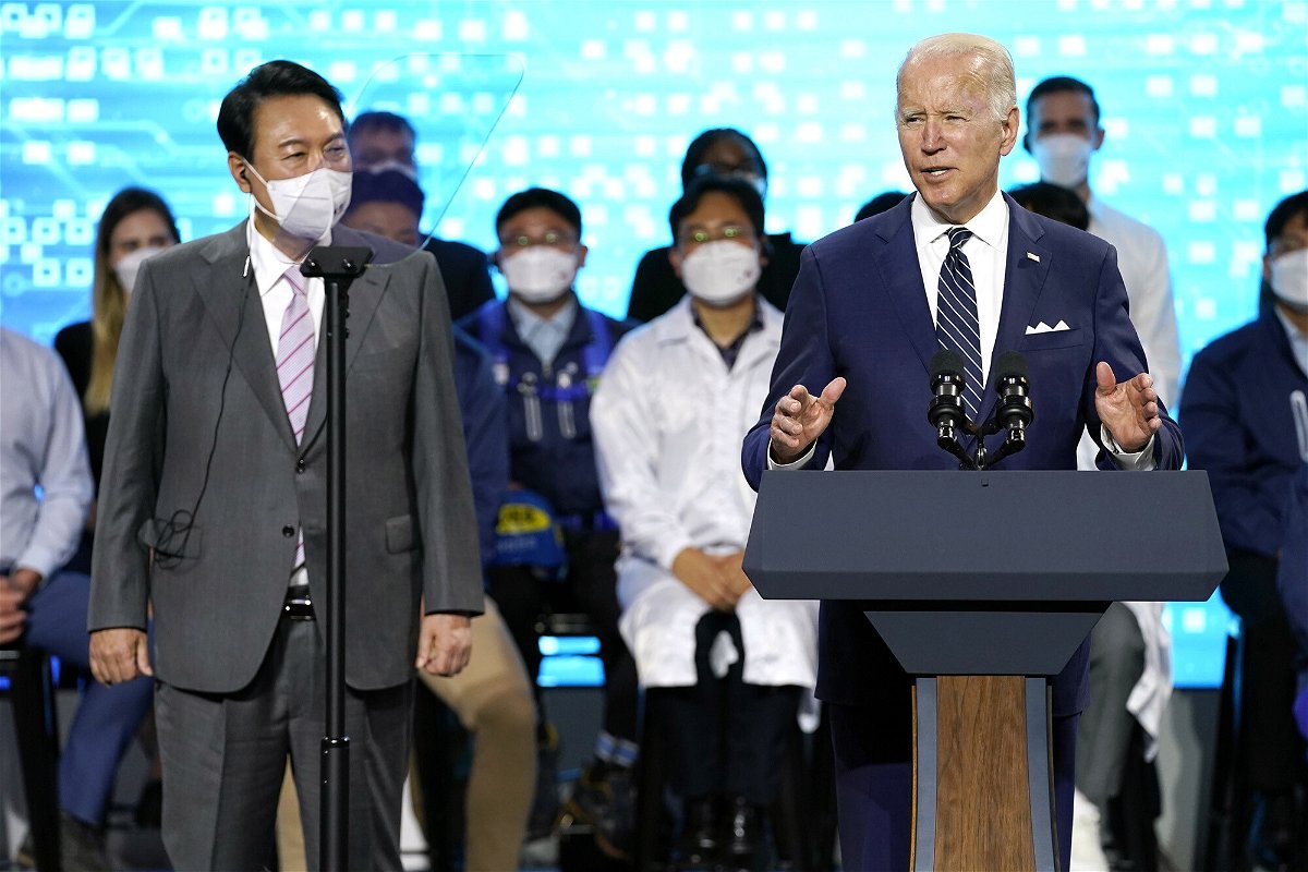 <i>Evan Vucci/AP</i><br/>President Joe Biden delivers remarks with South Korean President Yoon Suk Yeol as they visit the Samsung Electronics Pyeongtaek campus