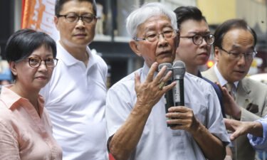 Cardinal Joseph Zen Ze-kiun (centre) was arrested by Hong Kong's national security police on May 11.