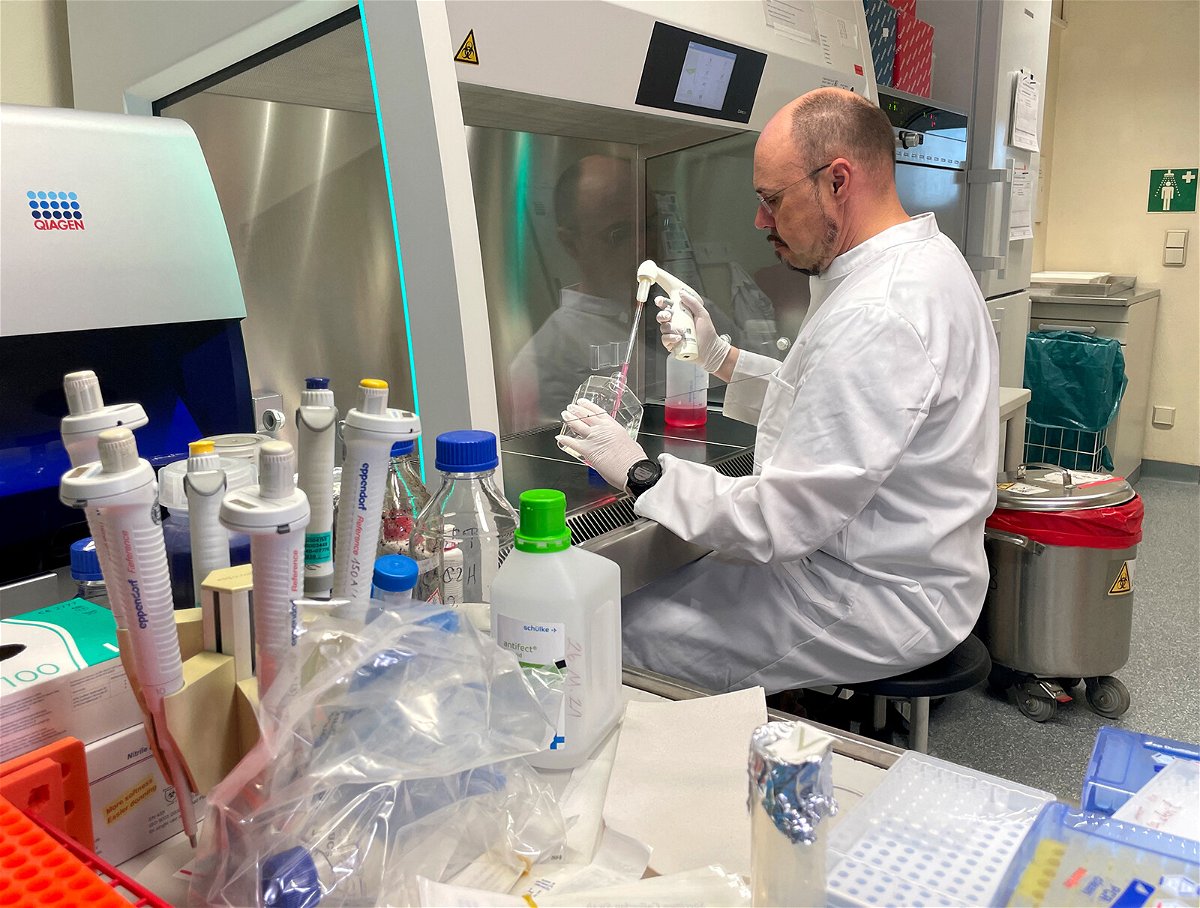 <i>Christine Uyanik/Reuters</i><br/>Head of the Institute of Microbiology of the German Armed Forces Roman Woelfel works in his laboratory in Munich