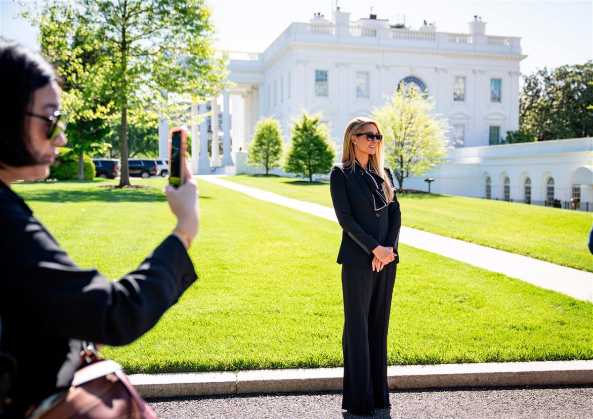 <i>Drew Angerer/Getty Images</i><br/>Actress and model Paris Hilton stands outside the White House on May 10 in Washington. Hilton met with officials at the White House during a trip aimed at her ongoing advocacy against child abuse.