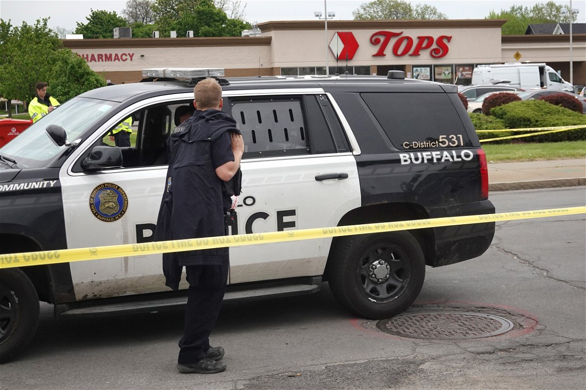 <i>Scott Olson/Getty Images</i><br/>Police and FBI agents continue their investigation of the shooting at Tops Market on May 16 in Buffalo