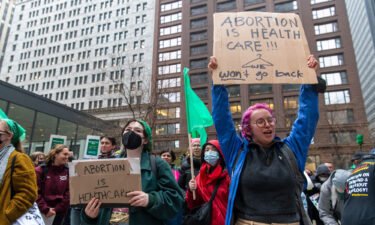 Protestors held a rally in Chicago on May 3 following the leak of a Supreme Court draft that indicated the Supreme Court may overturn Roe v. Wade.