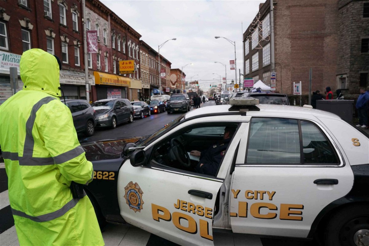 <i>BRYAN R. SMITH/AFP via Getty Images</i><br/>Mass shooters are increasingly attacking 'soft targets' such as supermarkets. Experts say securing them will be difficult. Police are scene gathering at the scene of a shooting at a Jewish deli in December 2019