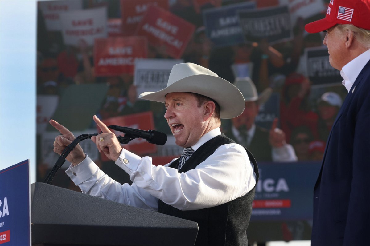 <i>Scott Olson/Getty Images</i><br/>Former President Donald Trump listens as Nebraska gubernatorial candidate Charles Herbster speaks during a rally at the I-80 Speedway on May 1 in Greenwood