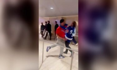 A man was arrested and charged after allegedly assaulting two men at Madison Square Garden Thursday